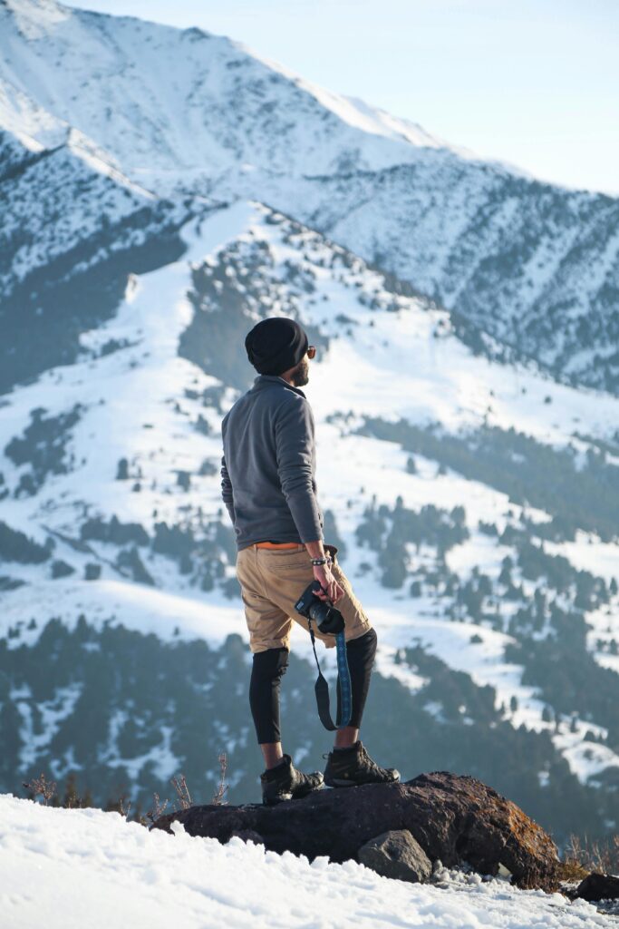A winter adventurer enjoying his photography hobby, wearing the customizable insulation boots.
Citation:
Gomez, O. (2018). Man wearing gray long-sleeved shirt on mountain. Retrieved from https://www.pexels.com/photo/man-wearing-gray-long-sleeved-shirt-and-brown-shorts-holding-black-dslr-camera-on-mountain-925263/